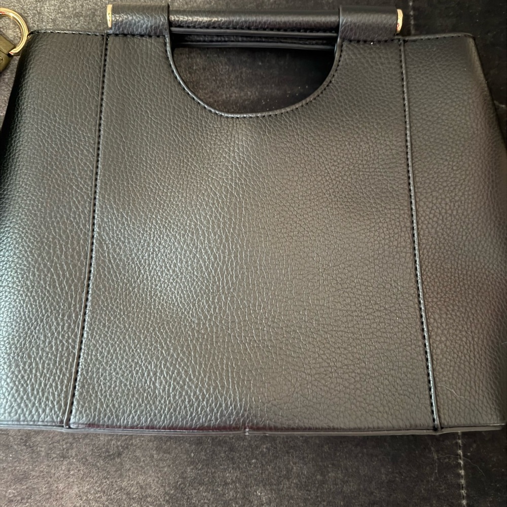 Sleek Black Leather Tote with Cutout Handle